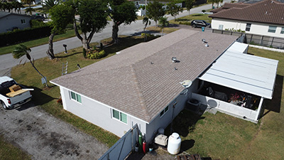 Shingle roofing completed - front view