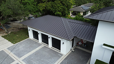 finishing details of metal roof in Pinecrest