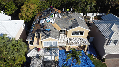 White tile roofing installation in progress in Pembroke Pines FL