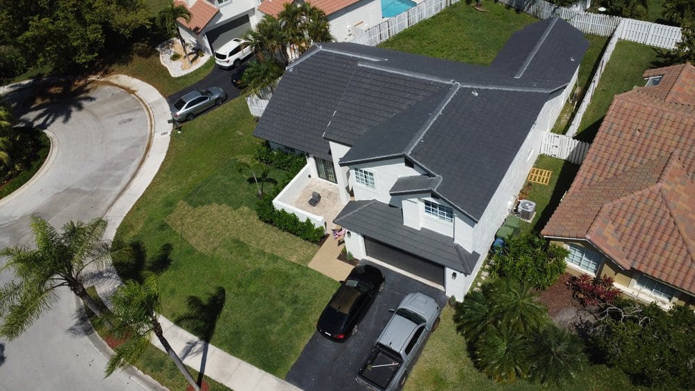 Charcoal Flat Tile Roof Installation in Weston FL 33326 - Photo 1