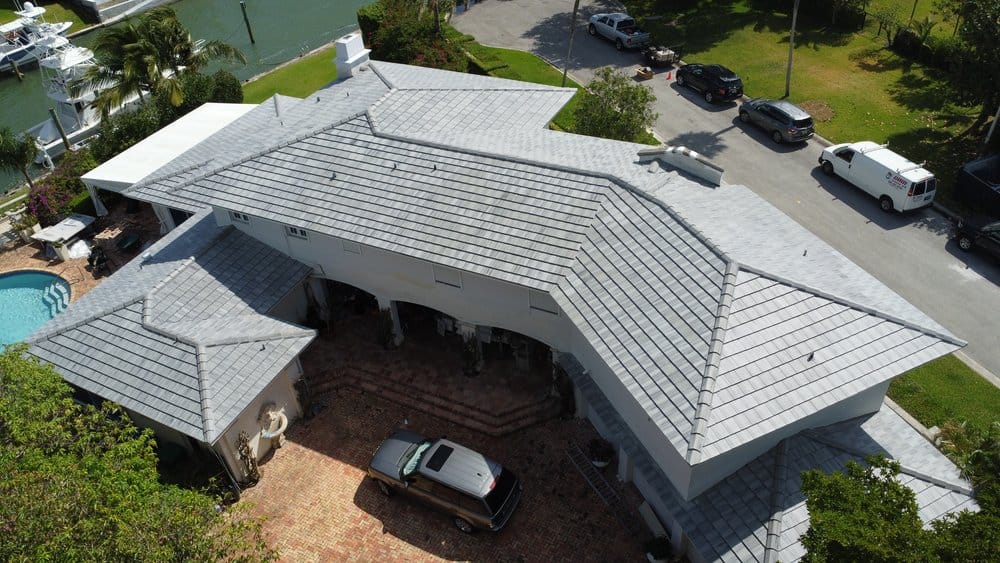 Gray Flat Tile Roof Installation in Miami FL 33137 - Photo 1